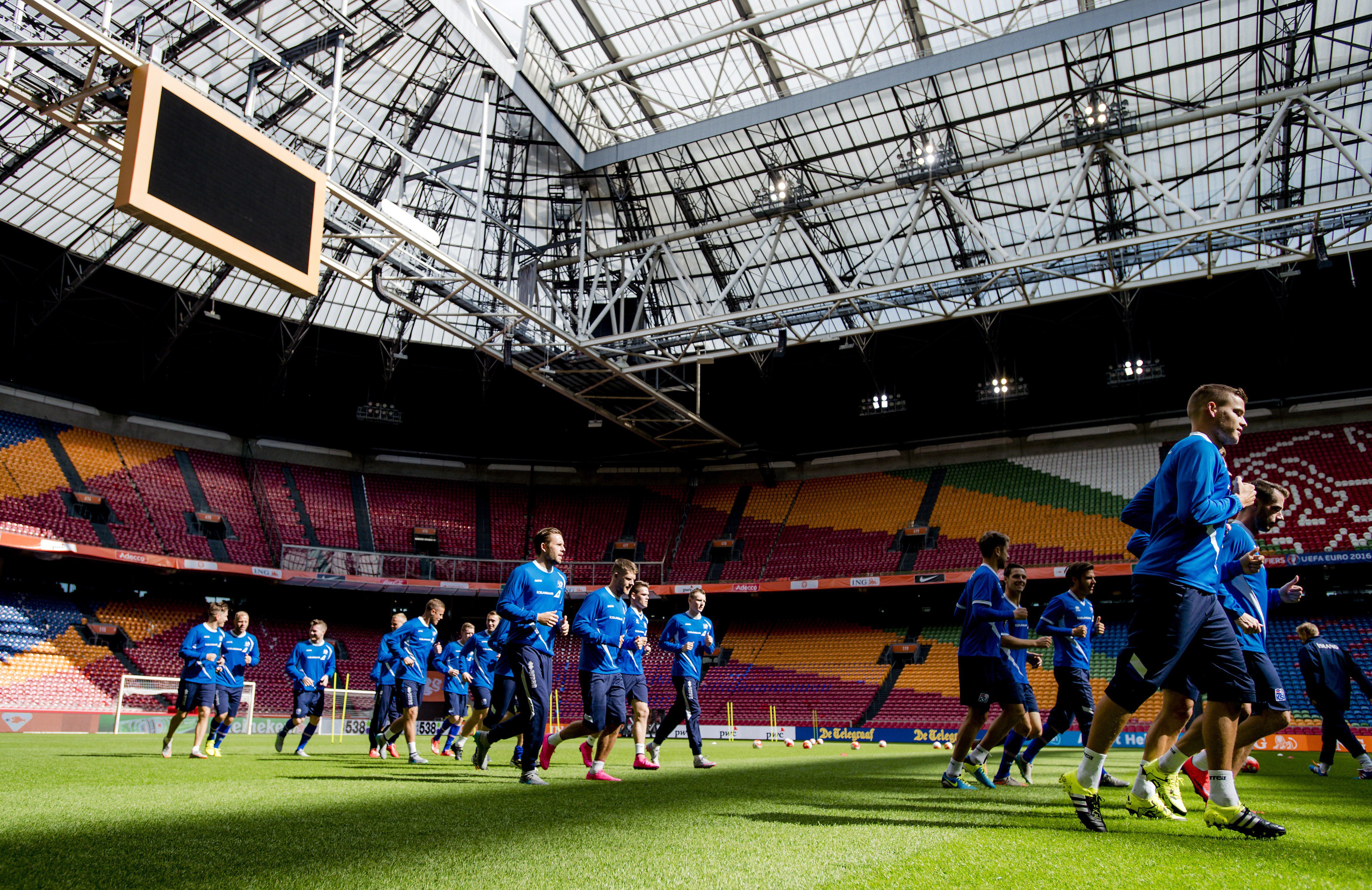 Iceland's national football team players train in the Amsterdam Arena, in Amsterdam, the Netherlands, on September 2, 2015, in preparation for their Euro 2016 qualifying football match against the Netherlands. ANP ROBIN VAN LONKHUIJSEN  --NETHERLANDS OUT--        (Photo credit should read ROBIN VAN LONKHUIJSEN/AFP/Getty Images)