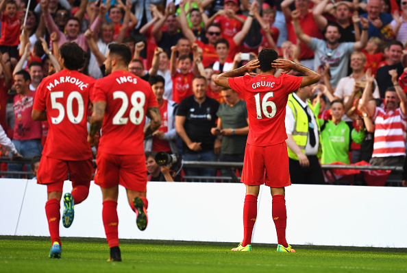 LONDON, ENGLAND - AUGUST 06: Marko Grujic of Liverpool celebrates scoring his team's fourth goal during the International Champions Cup match between Liverpool and Barcelona at Wembley Stadium on August 6, 2016 in London, England. (Photo by Mike Hewitt/Getty Images)