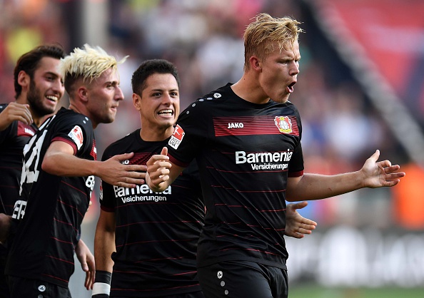 Joel Pohjanpalo celebrates his hat-trick goal against Hamburg. Patrik Stollarz / AFP / Getty Images