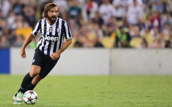 Andrea Pirlo of Juventus passes the ball against the Los Angeles Galaxy during their International Champions Cup football match at Dodger Stadium in Los Angeles, California on August 3, 2013, where the LA Galaxy defeated Juventus 3-1. AFP PHOTO/Frederic J. BROWN (Photo credit should read FREDERIC J. BROWN/AFP/Getty Images)