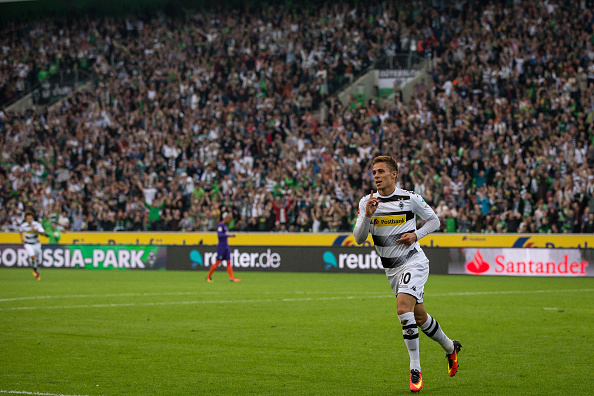 Thorgan Hazard celebrates scoring against Werder Bremen at a packed Borussia Park. Maja Hitij / Bongarts /Getty Images