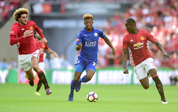 LONDON, ENGLAND - AUGUST 07: Demarai Gray of Leicester City skip past Eric Bailly of Manchester United and Marouane Fellaini of Manchester United during The FA Community Shield match between Leicester City and Manchester United at Wembley Stadium on August 7, 2016 in London, England. (Photo by Alex Broadway/Getty Images)