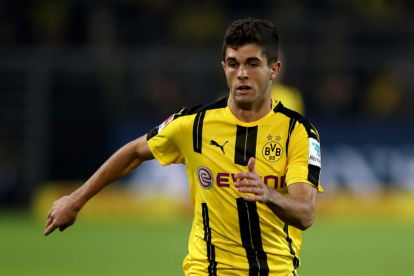 DORTMUND, GERMANY - OCTOBER 14: Christian Pulisic of Borussia Dortmund runs with the ball during the Bundesliga match between Borussia Dortmund and Hertha BSC at Signal Iduna Park on October 14, 2016 in Dortmund, Germany. (Photo by Lars Baron/Bongarts/Getty Images)