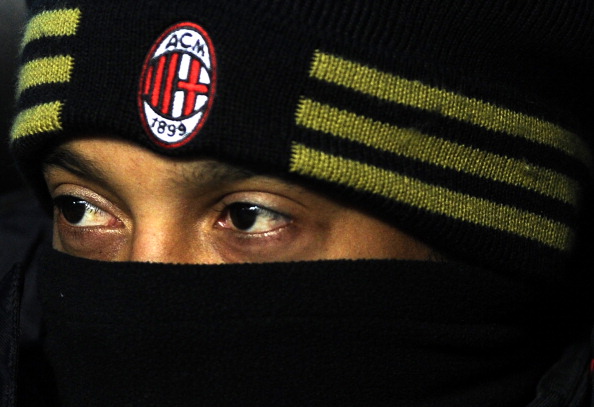 AC Milan's Brazilian forward Ronaldinho watches from the substitutes' bench during his team's Serie A match against Brescia on December 4, 2010 in the San Siro stadium in Milan. AC Milan won 3-0. AFP PHOTO / OLIVIER MORIN (Photo credit should read OLIVIER MORIN/AFP/Getty Images)